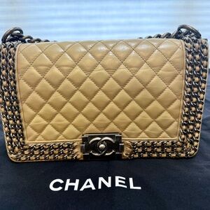 Authentic **Chanel Boy Flap Bag Quilted Caviar Leather Beige** - neutral color